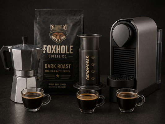 Foxhole Coffee Dark Roast bag with Moka pot, Aeropress, and Nespresso machine each with an espresso cup on black background
